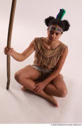 ANISE SITTING POSE WITH SPEAR